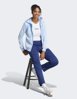 adidas - Essentials - Trainingsanzug in Glow Blue mit linearem Logo-Blau