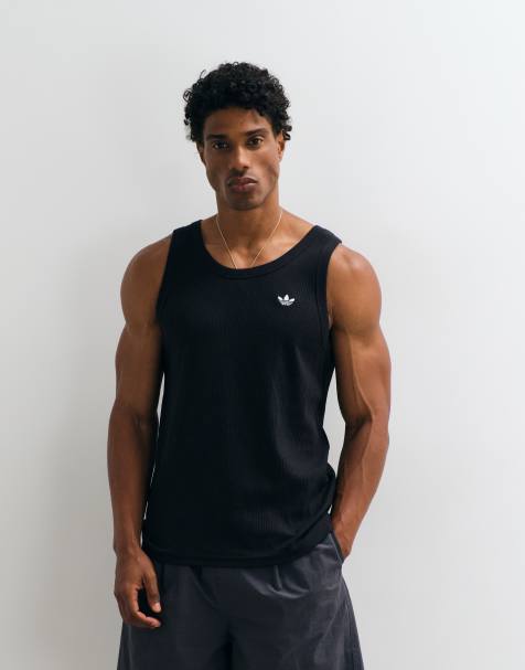 adidas Essentials trefoil tank top in black - view 1