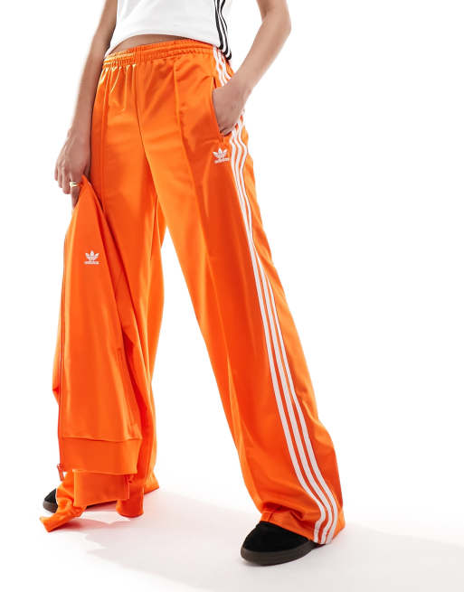 Adidas firebird best sale track pants orange