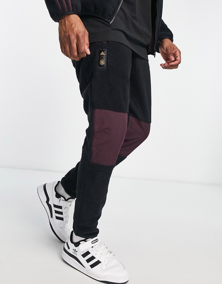adidas Football Germany World Cup 2022 Lifestyler fleece sweatpants in black