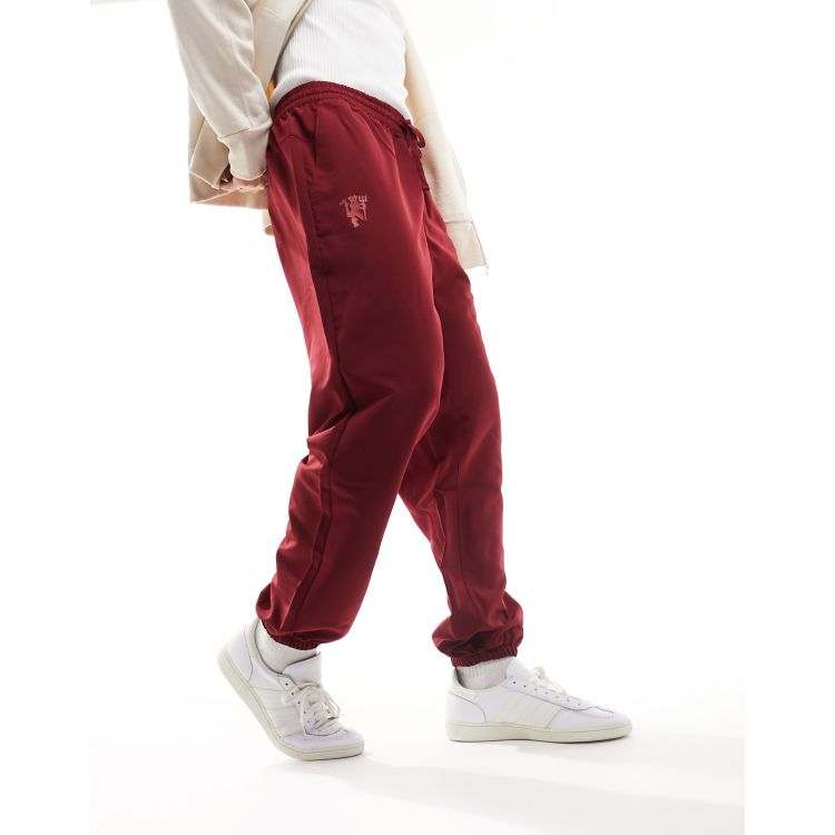adidas Football Manchester United joggers in burgundy ASOS