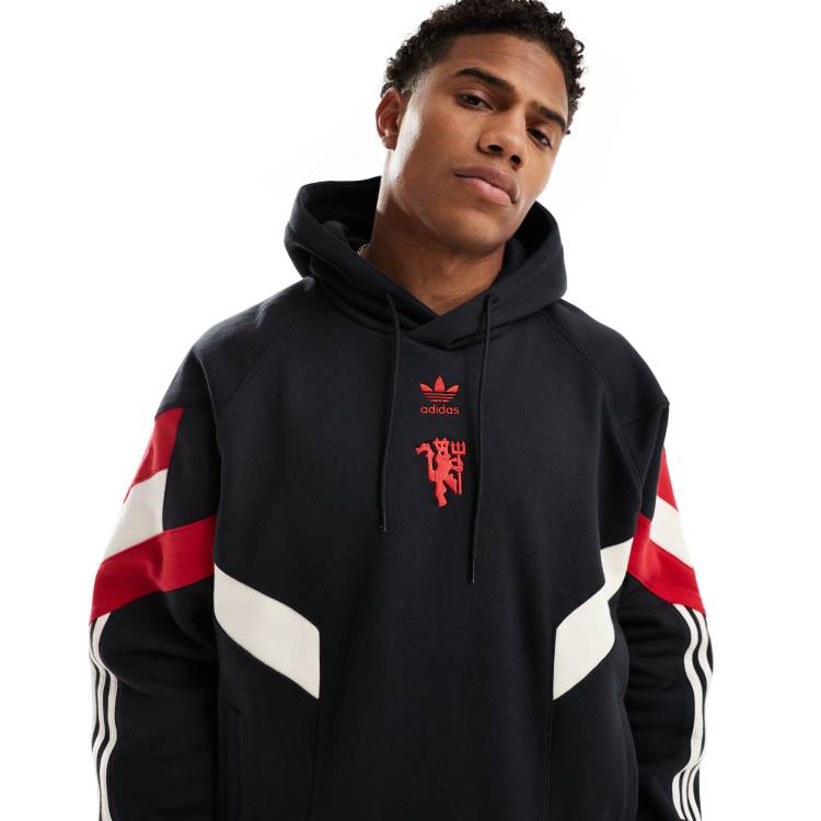 adidas Football - Maillot à logo Manchester United - Noir et jaune