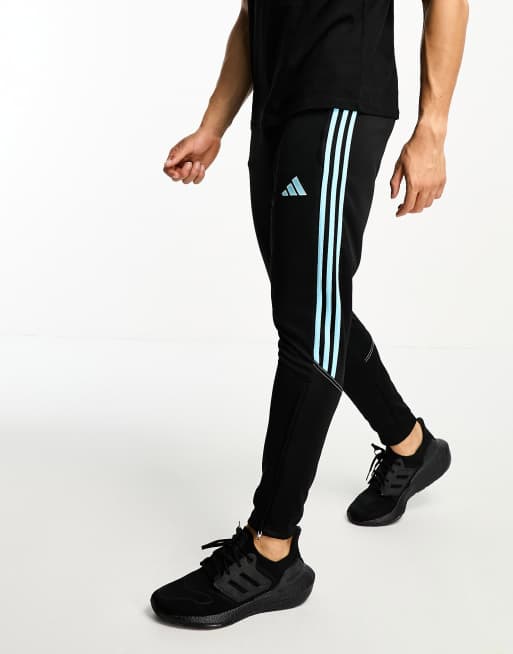 adidas Football Tiro 23 joggers in black and blue | ASOS