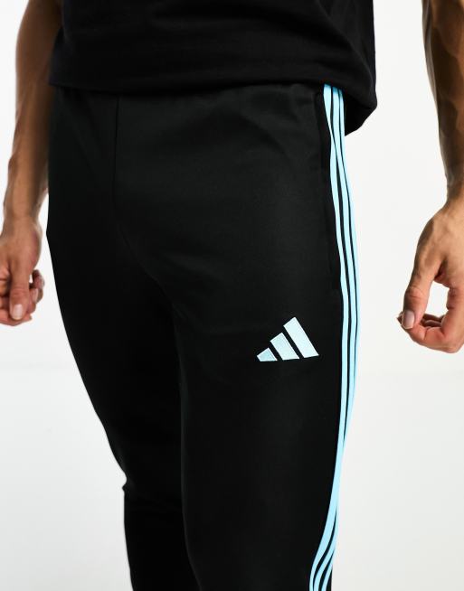 adidas Football Tiro track pants in black, ASOS