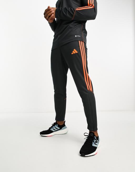 Orange and black sale adidas pants