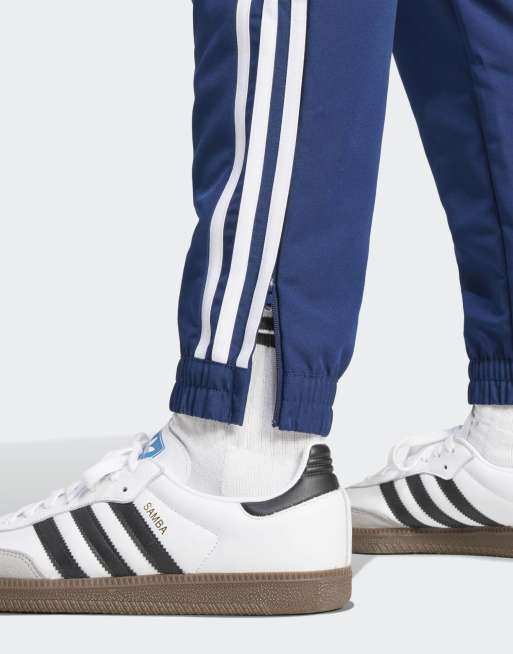 adidas Football Tiro 25 essentials woven pants in team navy / red , 2 of 5