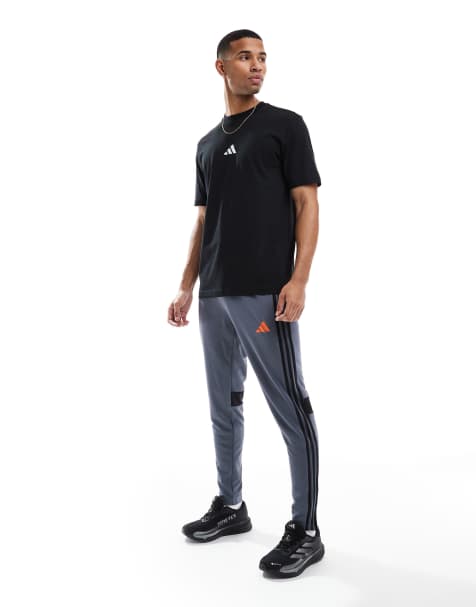 adidas Football Tiro essentials 3 stripe trackies in navy - view 1