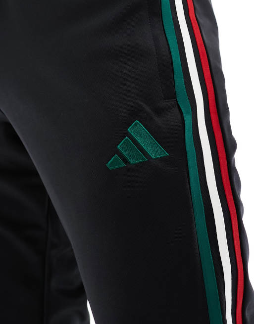 Black and hotsell green adidas pants