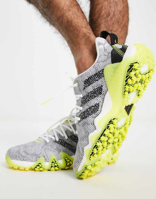 difícil Farmacología Gobernador adidas Golf Codechaos 22 shoes in grey and yellow | ASOS