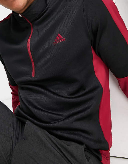 adidas Golf Felpa nera e rossa con pannelli e zip corta ASOS