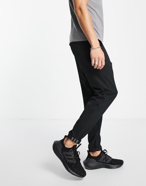 adidas Golf pinrolled pants in black ASOS