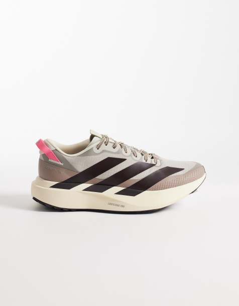 adidas - Hardlopen - Adizero EVO SL ATR - Sneakers in bruin, crème, zwart en roze - view 1