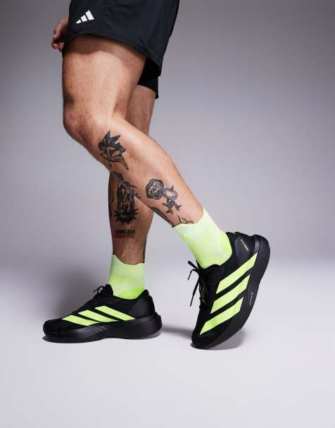 adidas - Hardlopen - Adizero Evo SL - Sneakers in zwart en geel - view 1