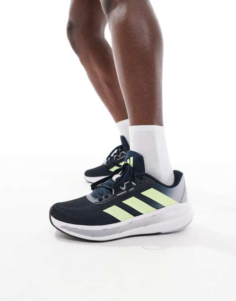 adidas - Hardlopen - Questar 3 - Sneakers in marineblauw en geel - view 1