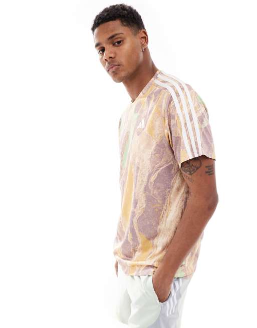 adidas - Hardlopen - T-shirt met marmerprint in neutraal
