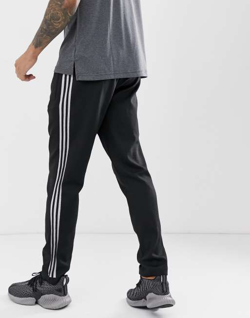 Adidas originals id store striker joggers in black