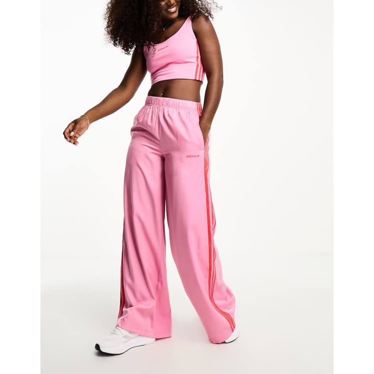 Pink stripe adidas pants hot sale