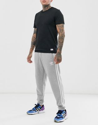 adidas - Joggingbroek met 3 strepen in grijs