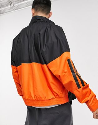 orange and black adidas jacket