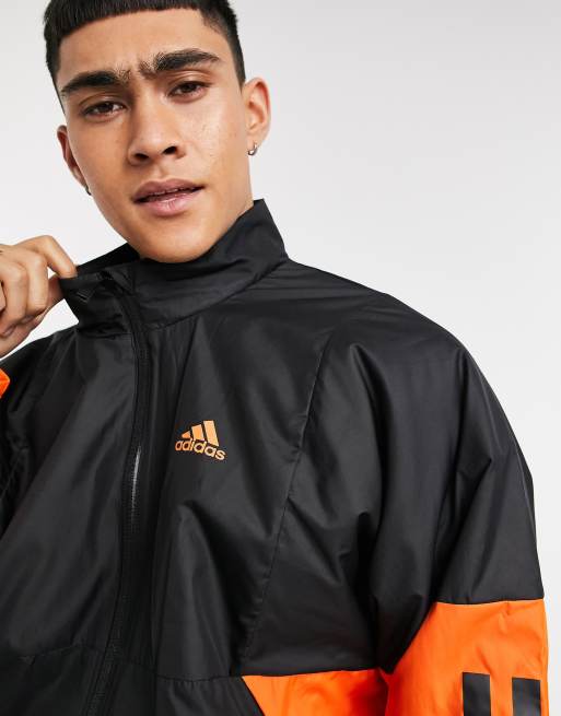 Adidas black jacket outlet orange stripes