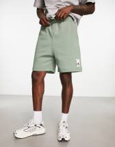 PUMA x MARKET Regular 8 inch shorts in off-white