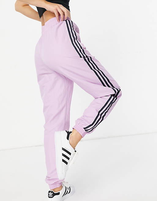 adidas nylon pants in purple