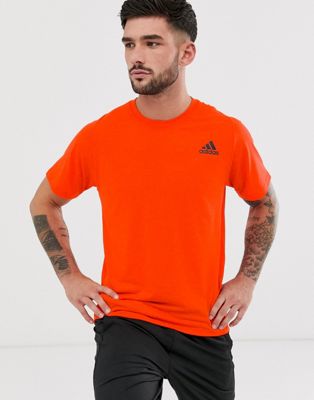 Adidas – Orange träningstopp med kort ärm