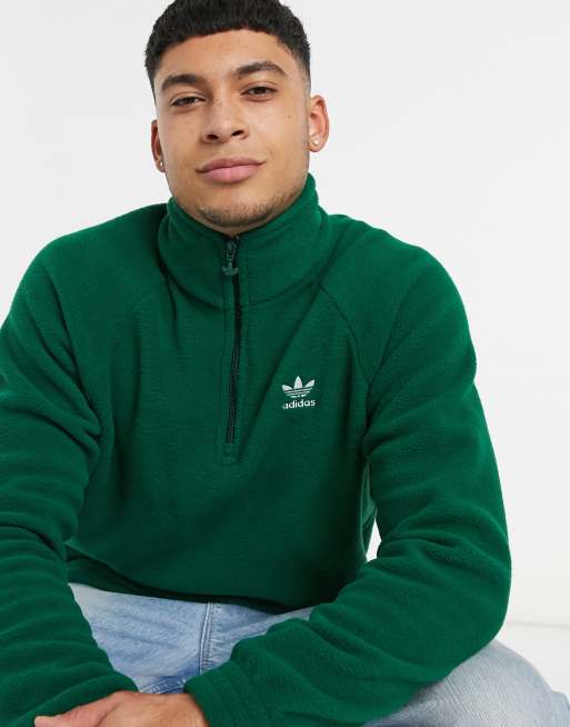 pala Predicar ballena azul adidas Originals 1/4 zip fleece in forest green | ASOS