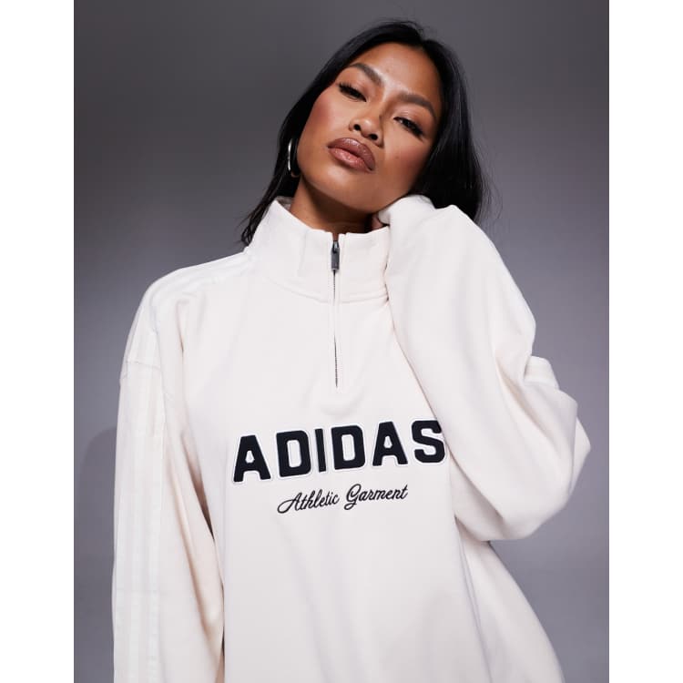  クリーム ジップアップジャージ adidas Originals 1/4 zip sweatshirt in cream with front graphic | ASOS