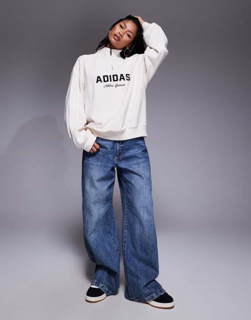  クリーム ジップアップジャージ adidas Originals 1/4 zip sweatshirt in cream with front graphic | ASOS