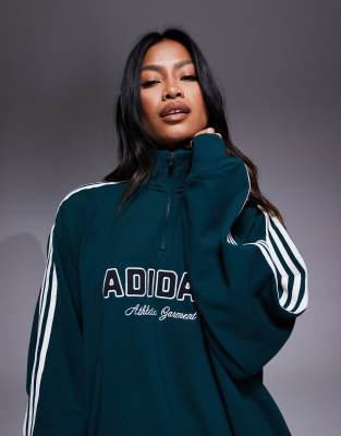 adidas Originals 1/4 zip sweatshirt in green with front graphic | ASOS