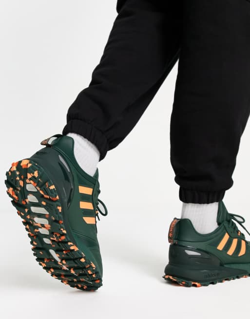 Adidas green and store orange