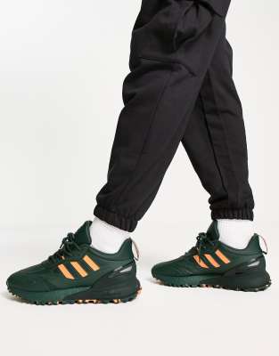 green orange adidas