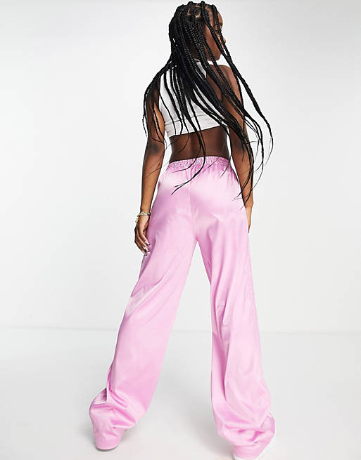 adidas Originals '2000s Luxe' satin wide leg pants in pink with rhinestone  logo