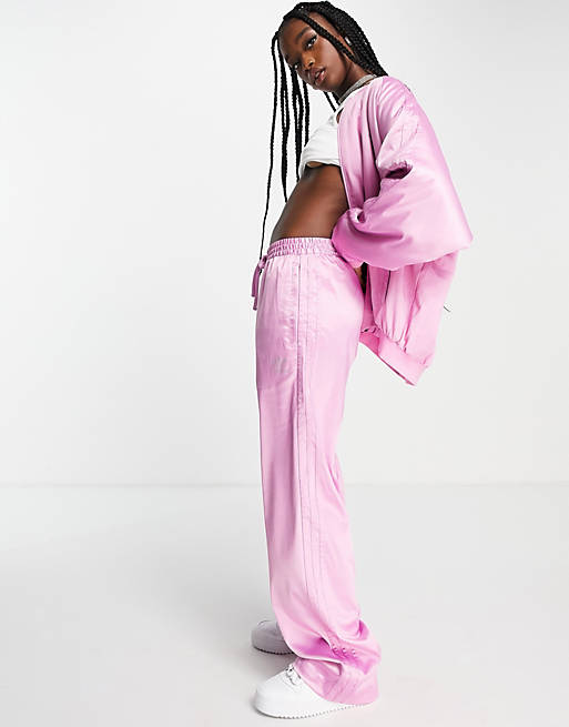 adidas Originals '2000s Luxe' satin wide leg pants in pink with rhinestone  logo