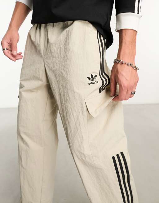 adidas Originals 3 Stripe sweatpants in brown