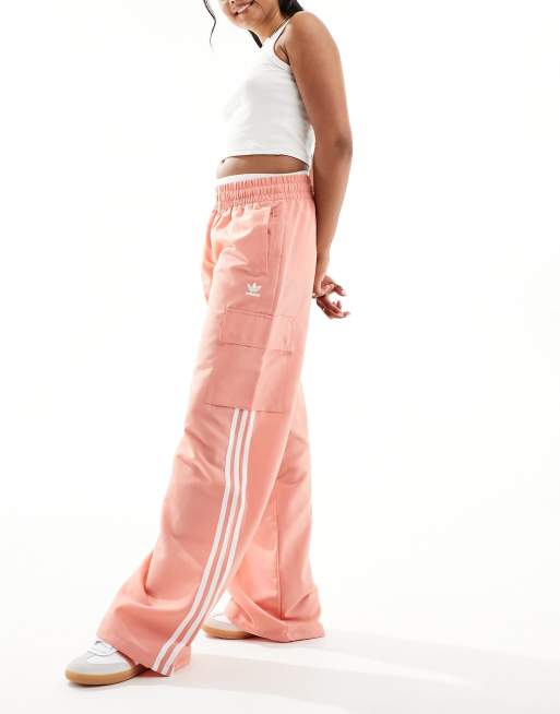 Adidas original three stripe track pant with vintage 2024 logo in pink