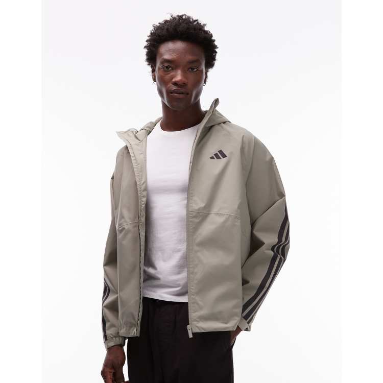 adidas Originals Stripe rain jacket in khaki ASOS