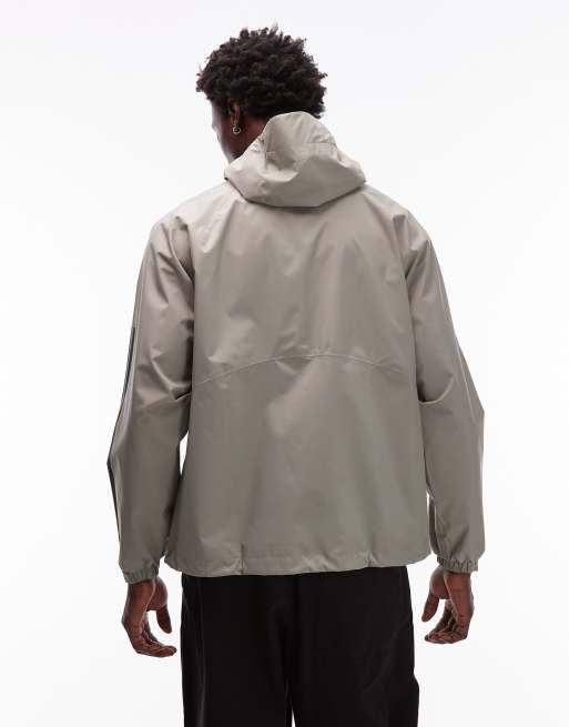 adidas Originals 3 Stripe rain jacket in khaki