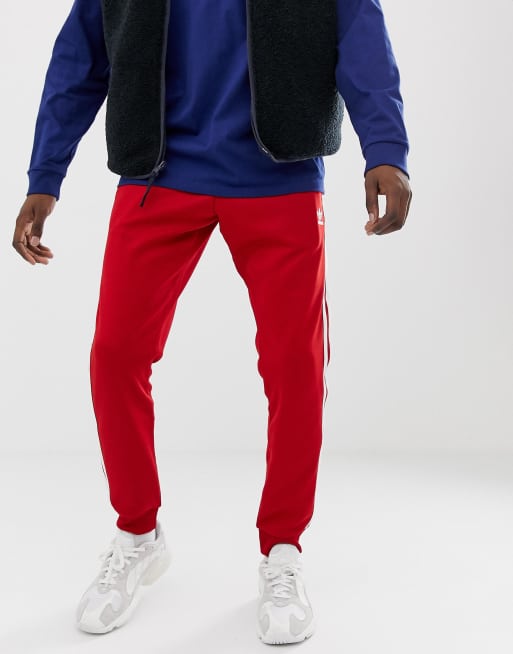 Red skinny adidas store pants