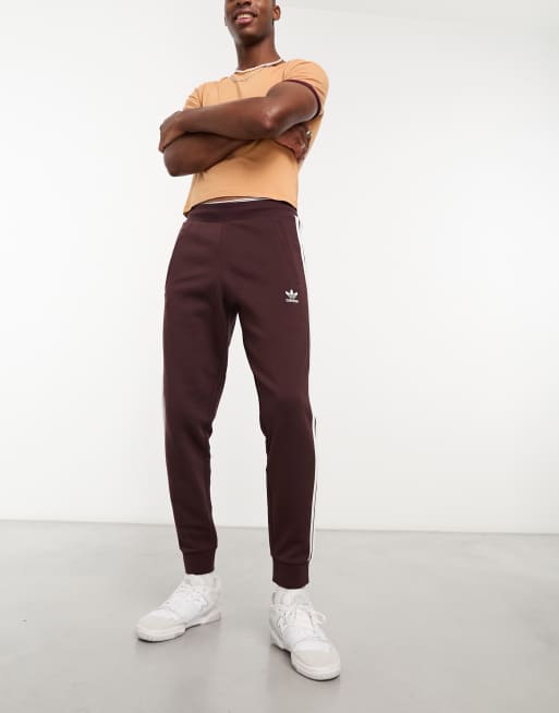 adidas Originals 3 Stripe sweatpants in brown