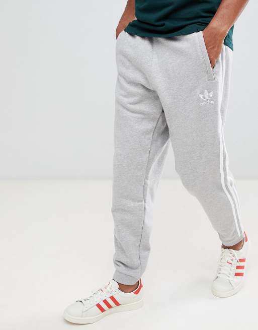 Adidas originals three stripe cheap cuffed sweat pants in grey