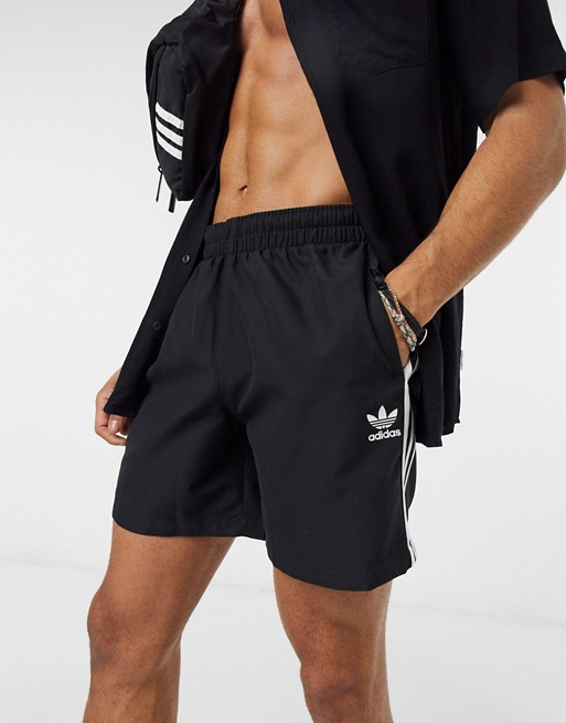 adidas Originals adicolor three stripe swim shorts in black