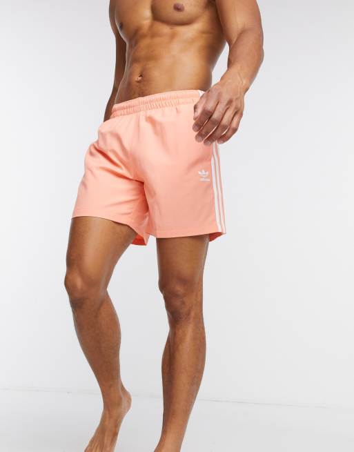 adidas Originals 3 stripe swim shorts in orange | ASOS