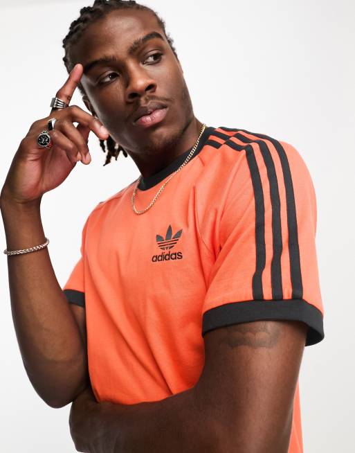 Adidas 3 stripes discount orange