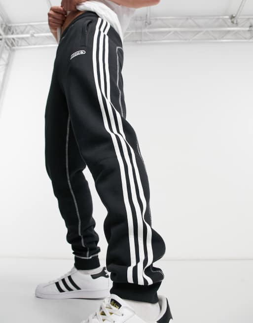 adidas Originals 3-Stripes contrast stitch sweatpants in black ASOS