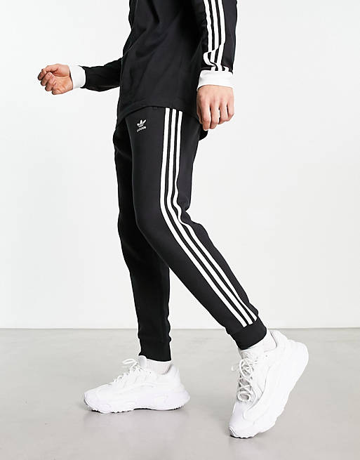 adidas Originals 3-Stripes Tall sweatpants black | ASOS