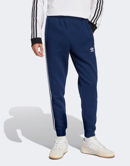 adidas Originals 3 stripes track pants in navy ASOS