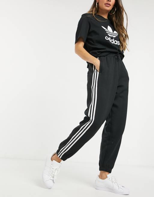 Adidas originals logo joggers in black hot sale