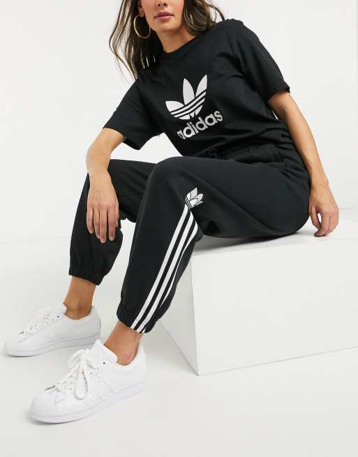 adidas Originals 3D trefoil logo cuffed joggers in black ASOS